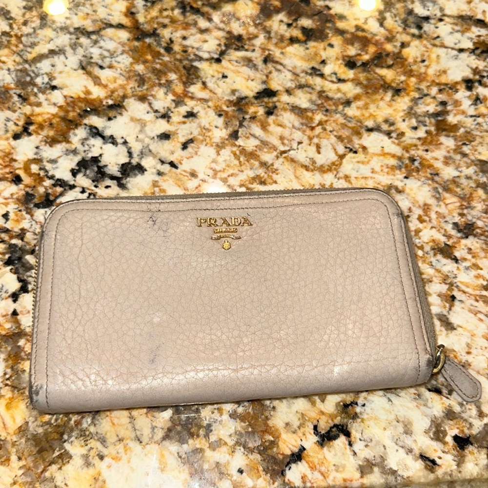 Prada zip wallet in gray